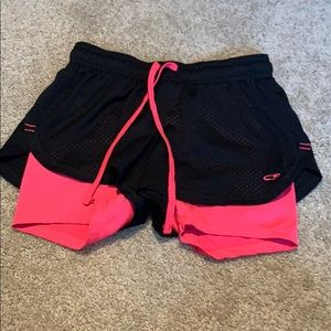 Black shorts with pink built in spandex